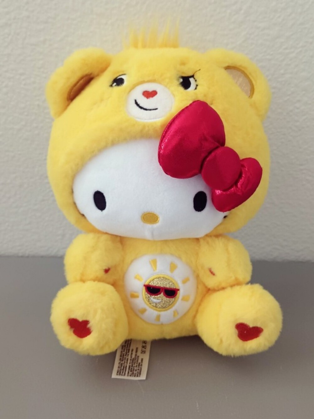 Hello Kitty And Friends Carebears Yellow Sun Plush with Red Bow